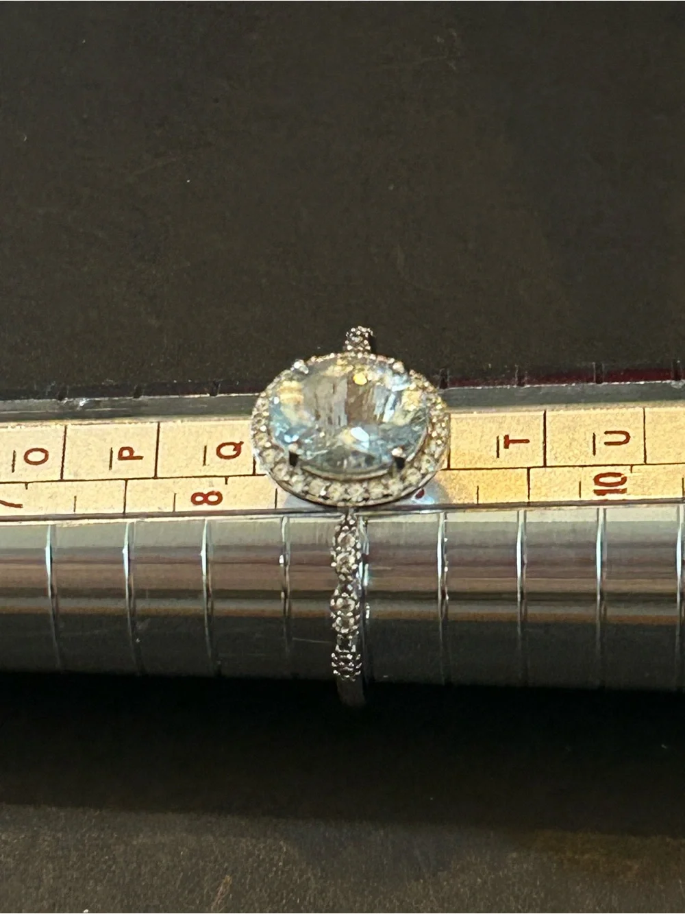 1.40CT Oval Aquamarine w/.16CTW Round White Zircon in Rhodium over 925 Silver S9
